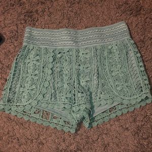 aqua flowey beach shorts